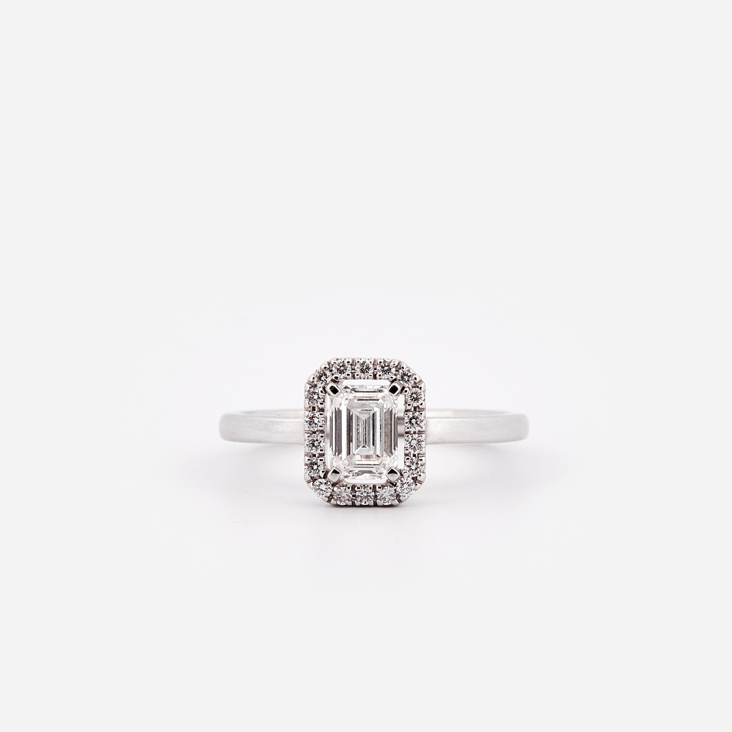 Emerald cut solitaire ring