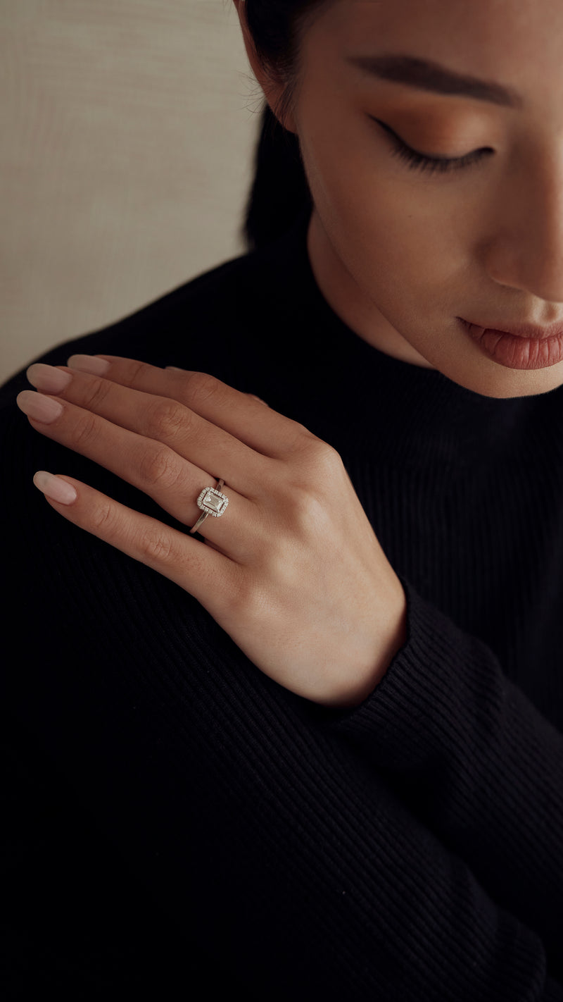 Emerald cut solitaire ring